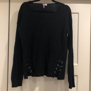 Navy blue sweater with gold detailing